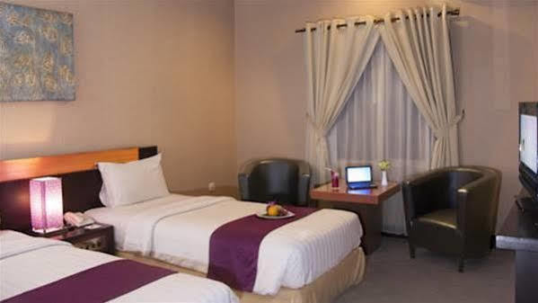 Orchardz Hotel Ayani Понтианак Экстерьер фото